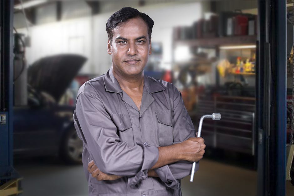 Professional auto glass technician assessing a vehicle